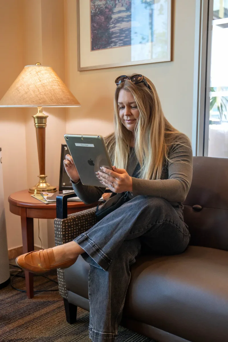 A patient relaxing in the Parkside Dental lobby